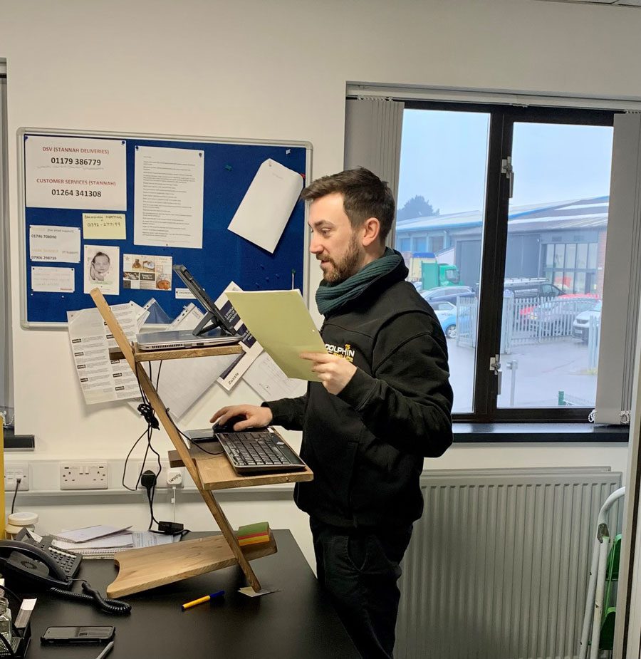 Adam in the office at Dolphin Stairlifts in Devon